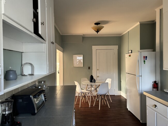 Kitchen/dining - 67 Warren St Unit Carriage House Furnished Apartment