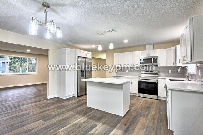 Photo - 5 Bed, 3 Bath Home in Orchards with Primary Bedroom on Main