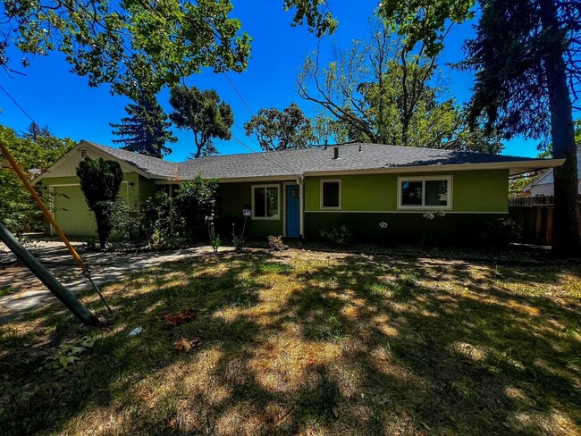 Photo - Freshly Renovated 3 Bedroom Home with Large Fenced Yard & Double Garage