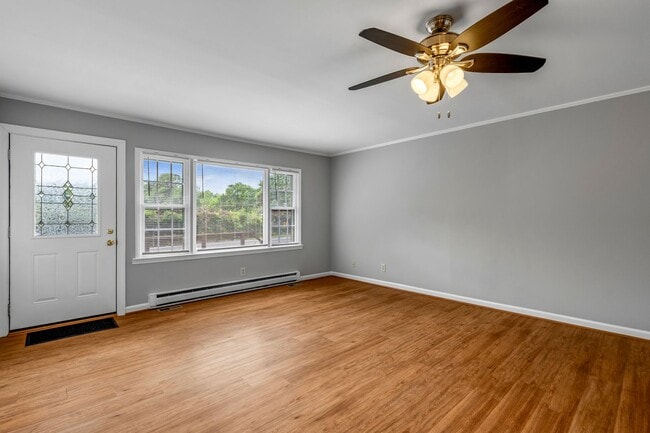 Photo - Updated Home, Stainless Steel Appliances, Wood Like Flooring, Deck, Garage!