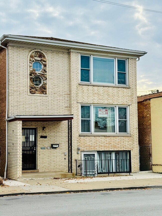 Building Photo - 4211 W 63rd St Unit 1FL