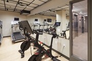 1,100 sf Fitness Center featuring Peloton bikes