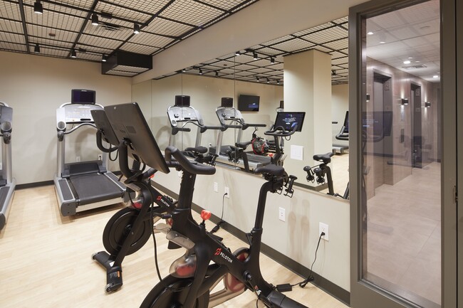 1,100 sf Fitness Center featuring Peloton bikes