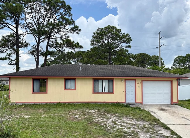 Building Photo - 322 Ixora Ave NW Rental