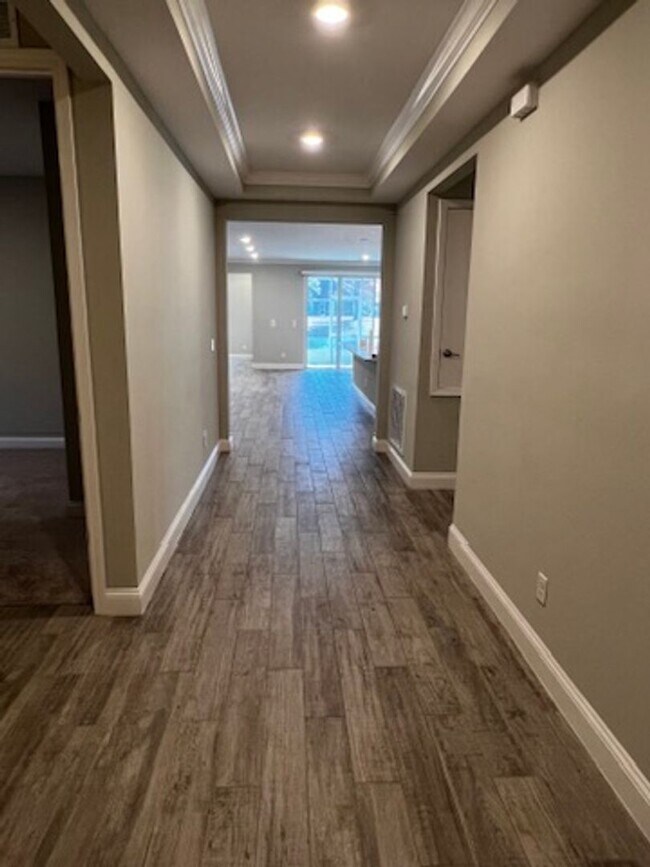 Photo - FOUR BEDROOMS and THREE BATHS For Rent