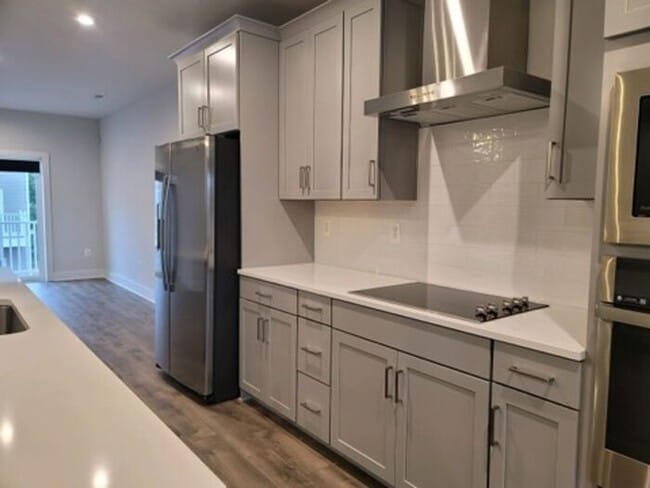 Like-New, Built in 2022, Gorgeous 2-story 3-Bedroom, 2.5 Bath Condo, located in the heart of Henr...