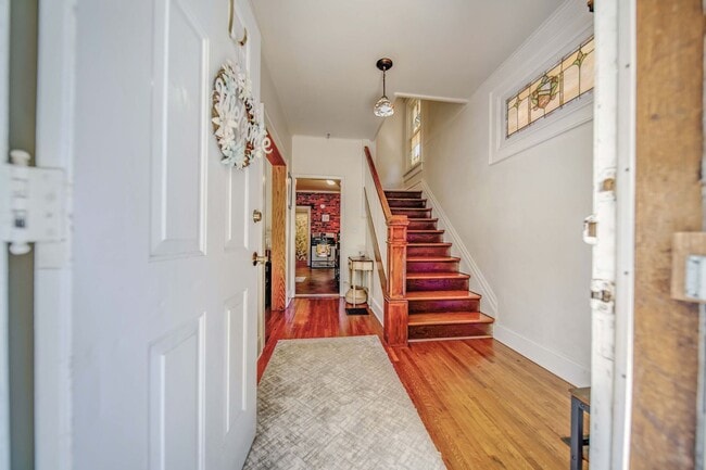 Photo - Charming 5-Bedroom Home with Exposed Brick...