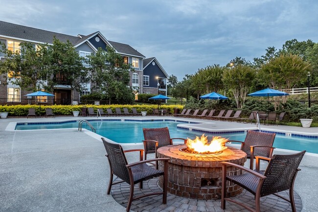 Fire Pit with Cozy Seating - Bexley at Brier Creek Apartments