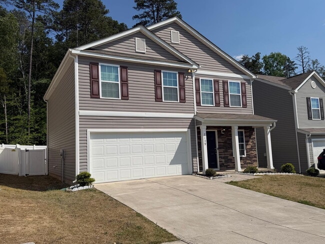 Photo - "Charming 3-Bed Oasis on Finnigan Rd: Spacious 1,994 Sq Ft with Granite Kitchen & Cozy Fireplace!"