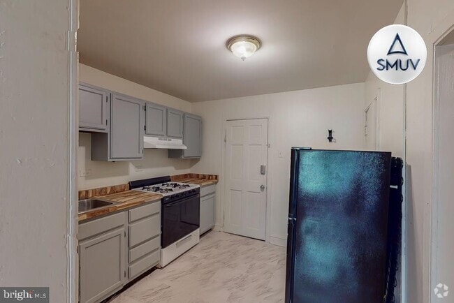 Building Photo - 929 N Calvert St Rental