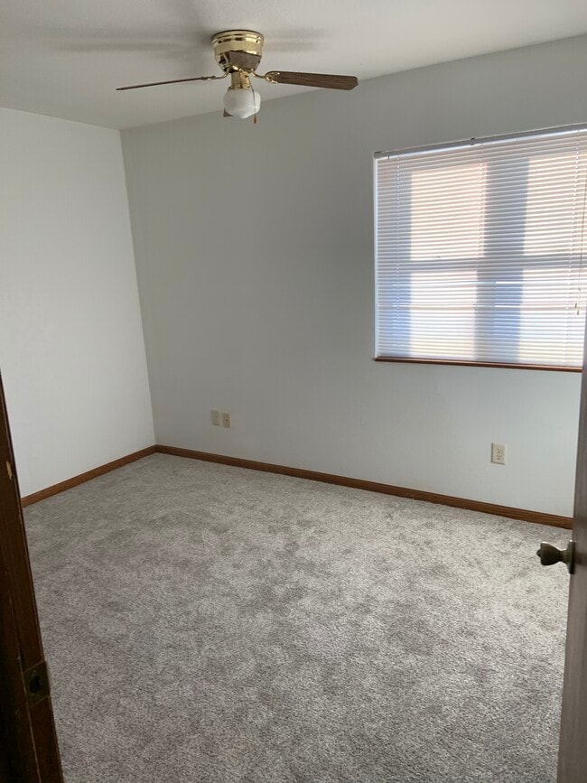Bedroom 2, new carpeting and freshly painted walls. Bedroom has a closet - 20427 W Clark Ave Unit 7