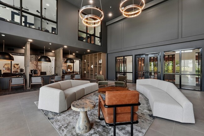 Leasing Office & Clubhouse Seating Area - Comfortable resident space for relaxing, working, meeting friends or gathering with neighbors.