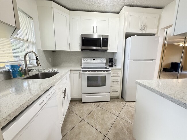 Building Photo - 9949 Sandalfoot Blvd Unit 514