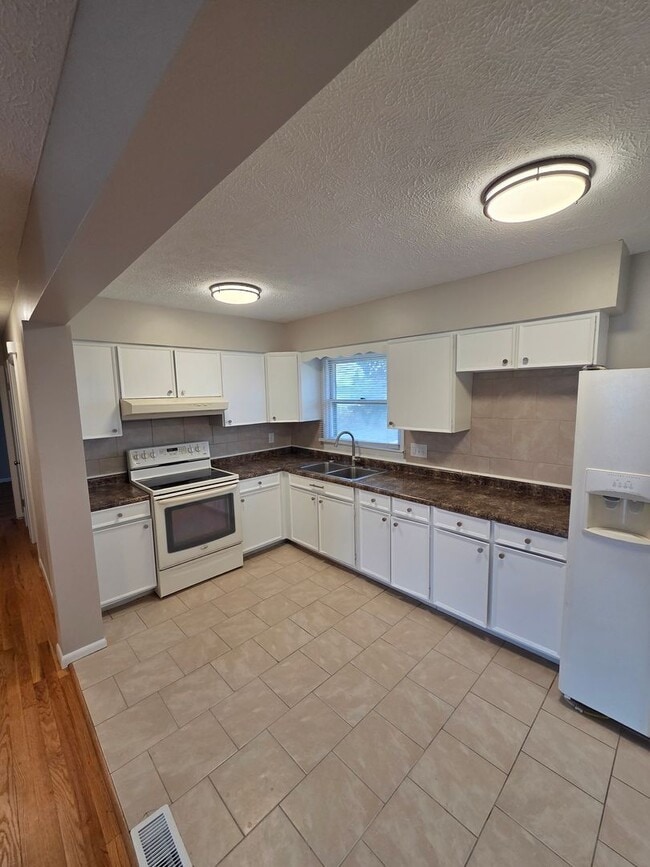 Photo - 3 bed, 2 bath, 1 car garage with finished basement, fenced back, newly remodeled