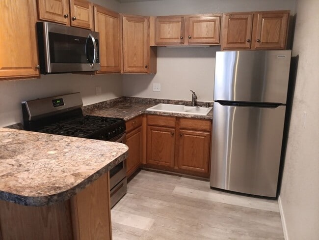 Building Photo - 1-bedroom, 1-bathroom home located in the ...