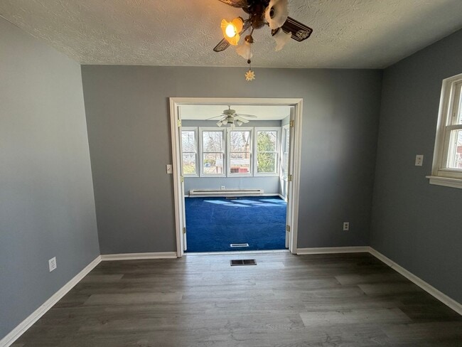 Photo - Bright Cape w/ Sunroom, Central Air, Big Basement & Backyard Shed