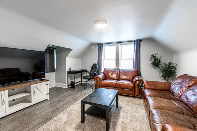 living room - 5126 75th St Apartments Unit upper