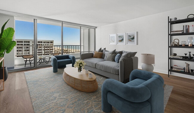 Living room leads to balcony for ocean views