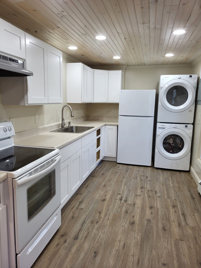 Kitchen with full sized washer and dryer - 163 Decatur St Unit Apt 201