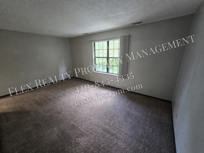 Building Photo - 3353 W Laskey Rd Unit 2