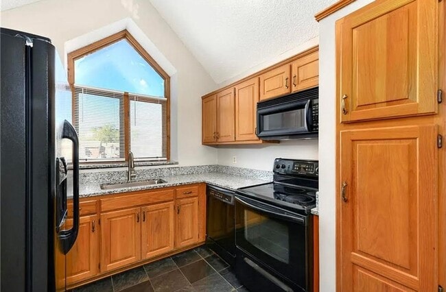 Photo - SEE IT NOW: Charming 2-Bedroom Condo in a Convenient Location!