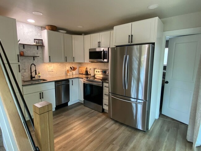 Photo - Charming 2-bed, 1-bath home in Sunnyside neighborhood, with private fenced backyard.