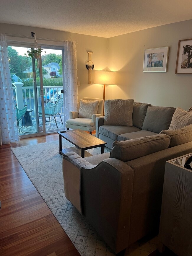 Living room with slider to the balcony - 200 Manning St Condo Unit 30C