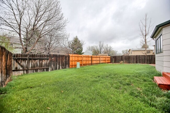 Building Photo - 4-Bedroom Home Near CSU | Fenced Yard & 2-Car Garage
