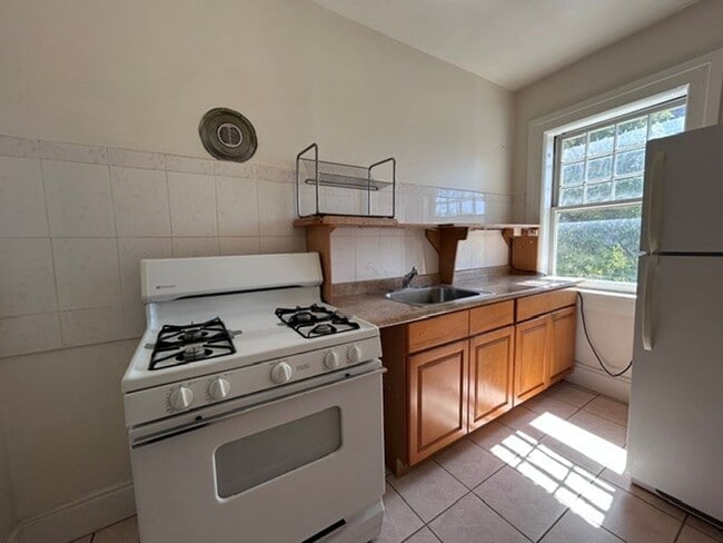 Photo - Spacious, Studio, One Bath Unit, with upgraded floors, above commercial shops Unit 4