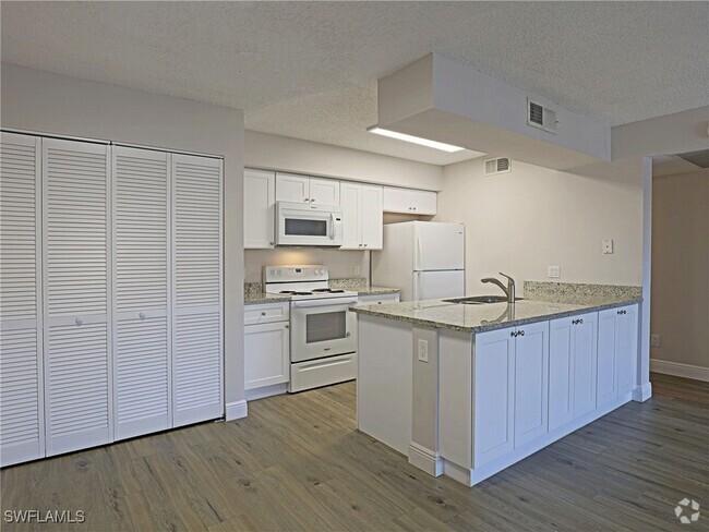 Building Photo - 5307 Summerlin Rd Unit 709 Rental