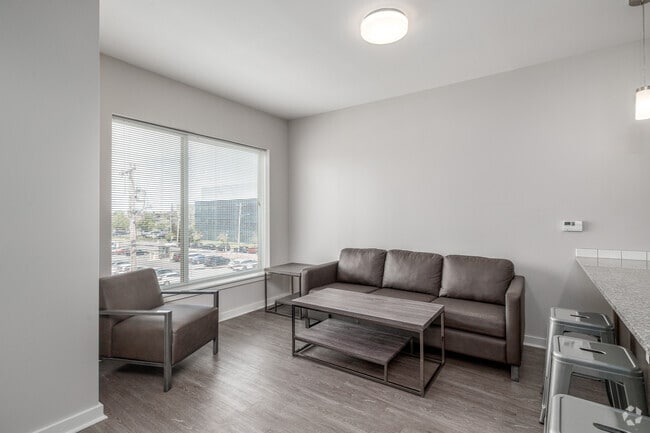 1BR, 1BA - 700SF - Living Room - Uncommon Apartments