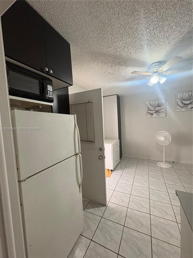 Building Photo - 2232 W 74th Terrace Unit 40C