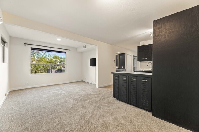 Living room from dining area - 1759 Silverwood Ter Unit Apartment 1