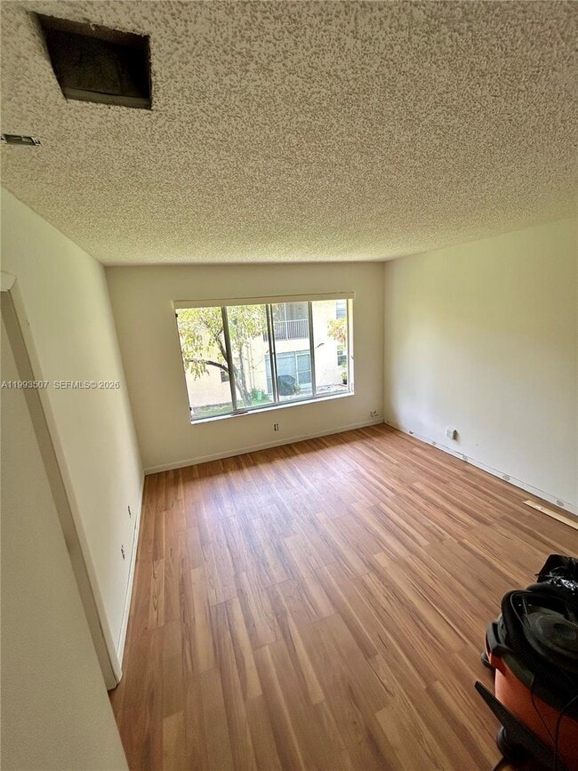 Building Photo - 3282 NW 102nd Terrace Unit 204-E