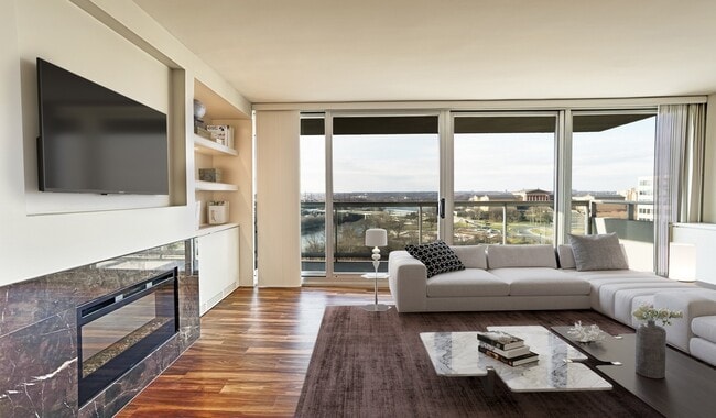 Wall-to-wall windows offer breathtaking penthouse views