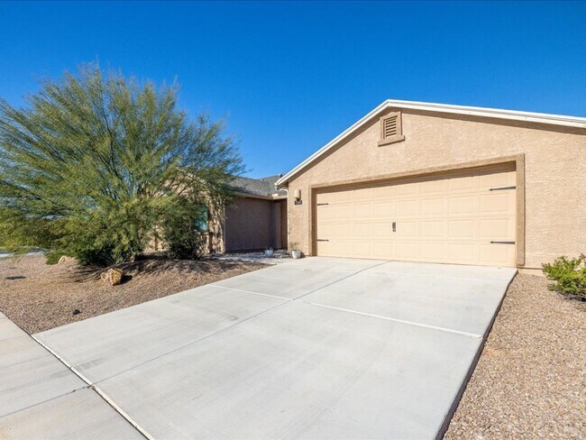 Photo - Spacious 4-Bedroom Home with Open Layout & Turf Backyard