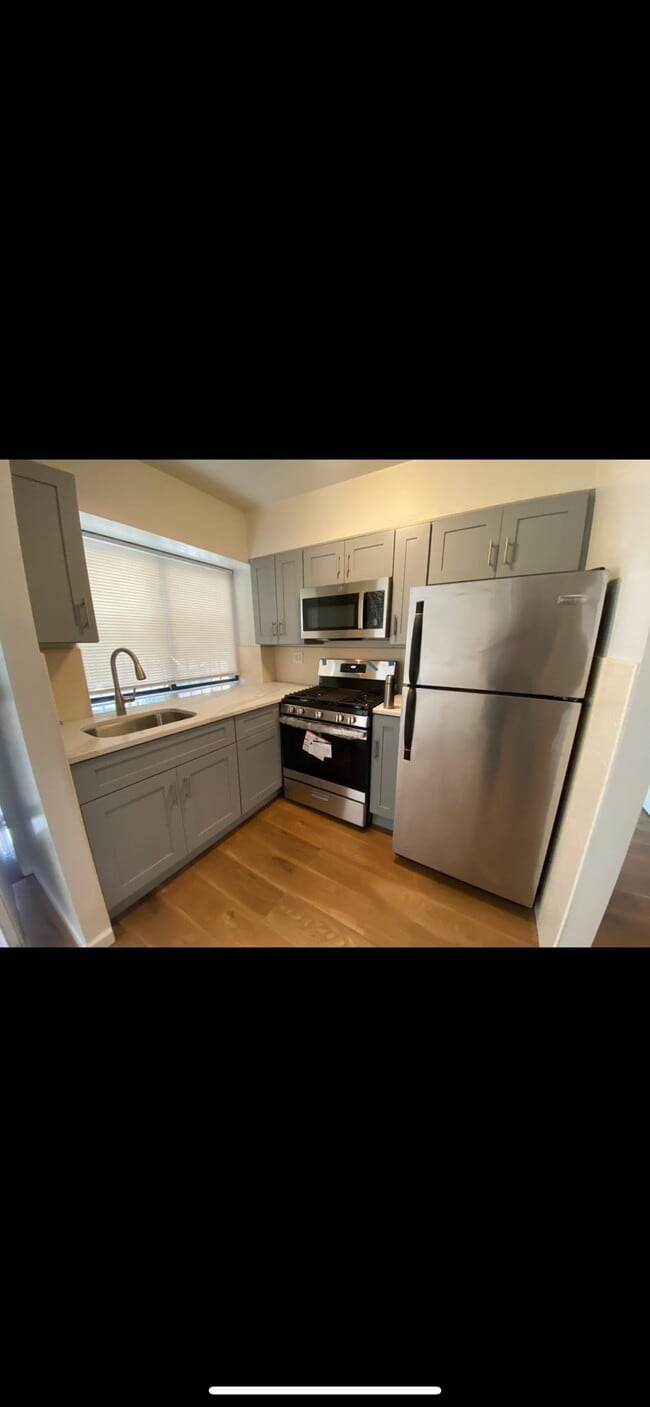 Photo - 73-26 Queens Midtown Expy Unit 1FL