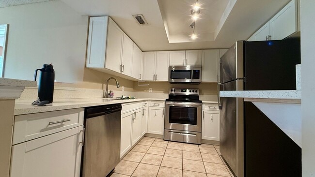 Photo - 2/2 First Floor with Garage + Lake View – Grand Isles