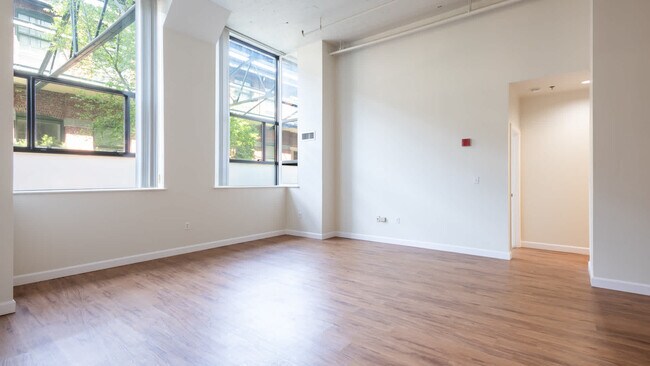 Living Room with Hard Surface Flooring - Lofts at Kendall Square