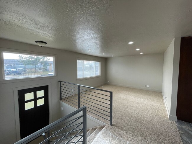 Photo - Spacious 6-Bedroom Magna Home with Fenced Yard