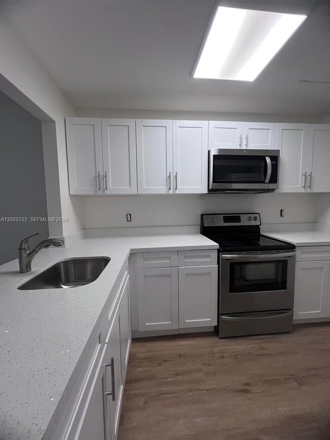 Building Photo - 2570 W 67th Pl Unit 21-2