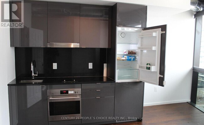 Photo - 21 Lawren Harris Square Unit 910