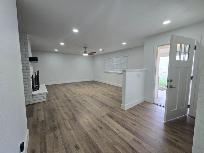 Photo - 3 Br 2 BA with extra room in back available now