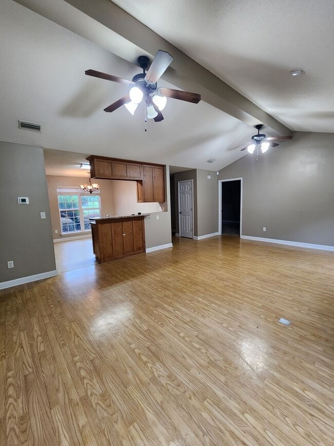 Photo - Charming 3BR/2BA Home with Open Floor Plan, Vaulted Ceilings & 2-Car Garage