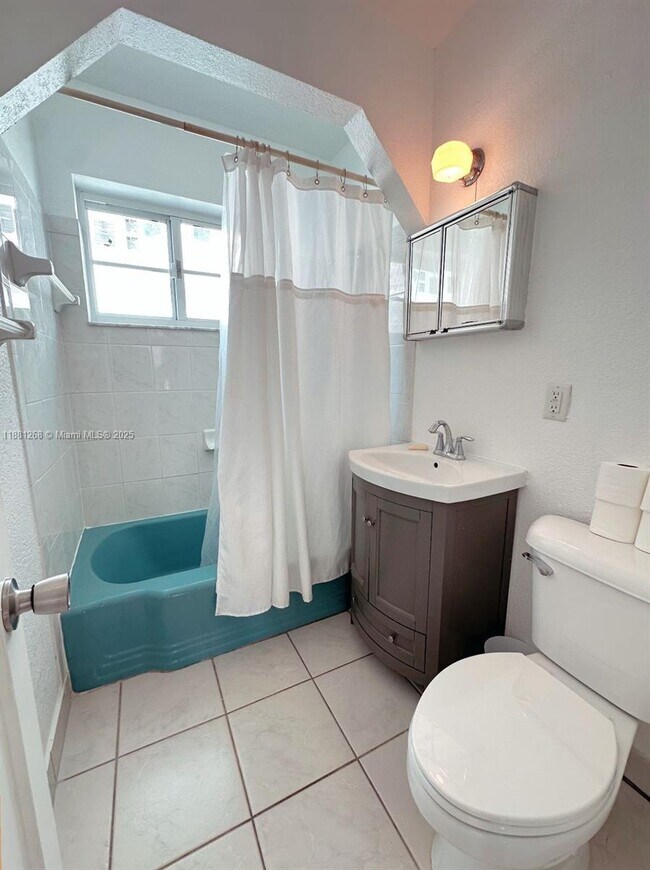 Photo - 7445 Harding Ave Unit 213