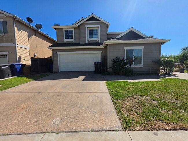 Building Photo - 3 bedroom with an extra office/den space in Modesto!