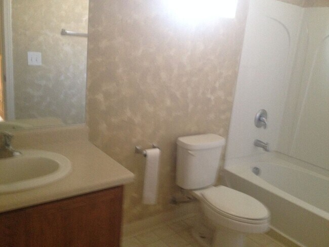 Photo - 3 Bed/2.5 bath. All Tile Downstairs. Open ...