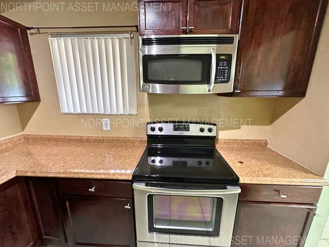 Photo - Charming 2-Bed, 2-Bath Home with Fenced Ya...