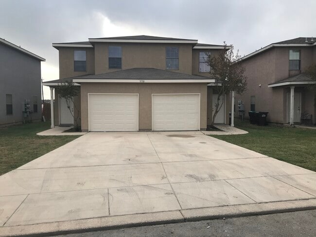 Garage Front - 5750 Golf Hts Apartments Unit #1