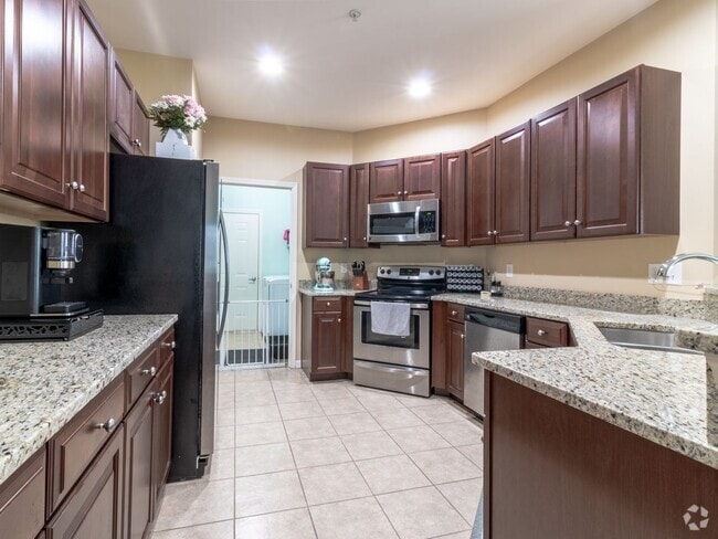 Building Photo - YEAR-ROUND - UNFURNISHED - CONDO  - WOODS ...